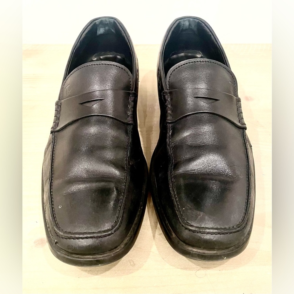 Tod’s Black Penny Loafers